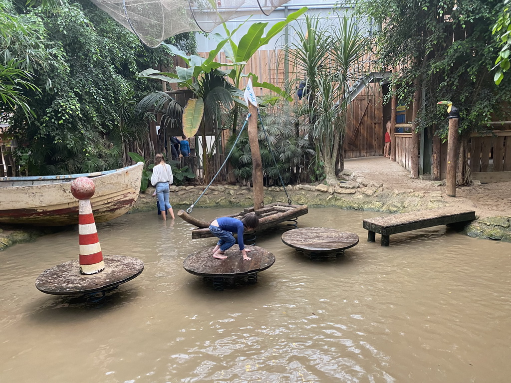 Max on a bridge at the playground at the Kids Jungle at the Berkenhof Tropical Zoo