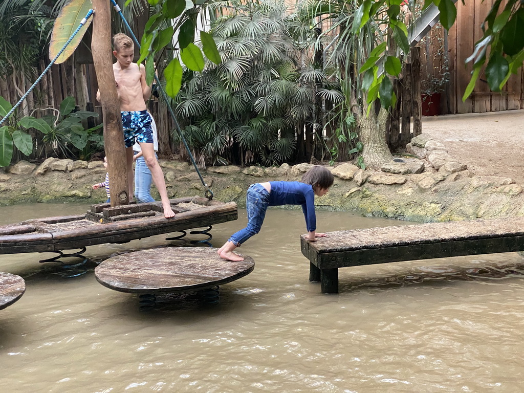 Max on a bridge at the playground at the Kids Jungle at the Berkenhof Tropical Zoo