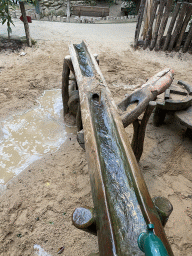 Water flowing from a water pump at the Kids Jungle at the Berkenhof Tropical Zoo