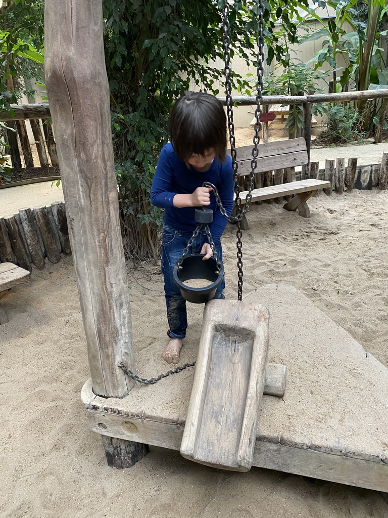 Max playing with sand at the Kids Jungle at the Berkenhof Tropical Zoo