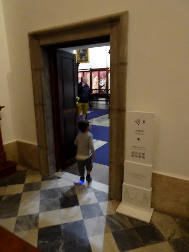 Max walking to the treasury of the La Laguna Cathedral