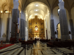 Miaomiao in front of the altarpiece at the Chapel of Our Lady of Remedies at the La Laguna Cathedral