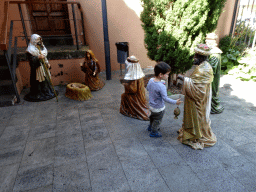 Max with a nativity scene just behind the tower of the Iglesia de la Concepción church