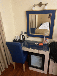 Table, frdige and mirror in our room at the Grand Hotel Park