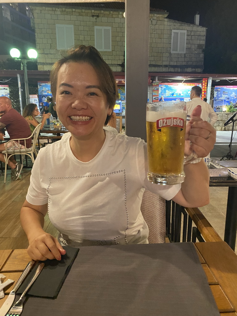 Miaomiao with an Oujsko beer at the Pull Over Restaurant