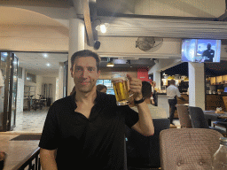 Tim with an Oujsko beer at the Pull Over Restaurant