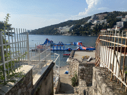 Bouncy castle at the Vis Beach, viewed from the path to the Masarykov Put street