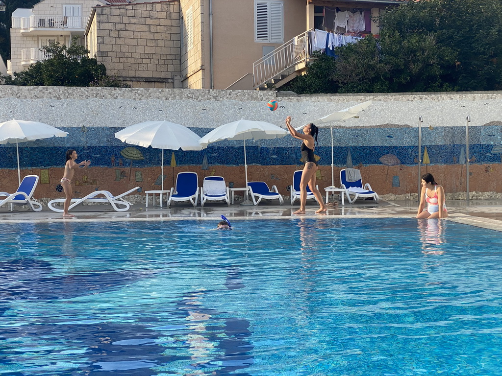 Max with goggles and snorkel at the outdoor swimming pool of the Grand Hotel Park