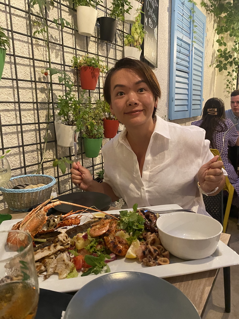 Miaomiao with a sea food platter at the Fish Bar El Pulpo