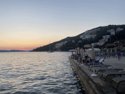 The Uvala Lapad Beach, the Adriatic Sea and the Kolocep island, at sunset