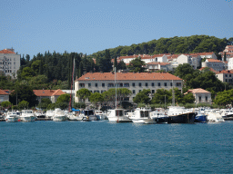 Boats at the Gru Port and buildings at the Ulica Nikole Tesle street, viewed from the Elaphiti Islands tour boat