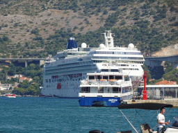 The cruise ship `Norwegian Gem` at the Gru Port, viewed from the Elaphiti Islands tour boat
