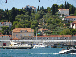Boats at the Gru Port and houses at the Lapadska Obala street, viewed from the Elaphiti Islands tour boat