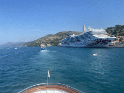 The cruise ship `Norwegian Gem` at the Gru Port, viewed from the Elaphiti Islands tour boat