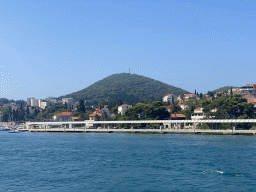 Pier at the Gru Port and the Velika Petka Hill, viewed from the Elaphiti Islands tour boat