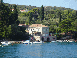 Boats in front of the Church of the Blessed Virgin Mary at the Ulica Ivana pl. Zajca street, viewed from the Elaphiti Islands tour boat