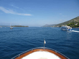 Tour boat leaving the Gru Port, the Daksa island and the Adriatic Sea, viewed from the Elaphiti Islands tour boat
