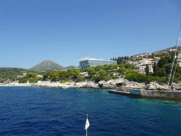 The Sun Gardens Dubrovnik hotel and its pier and beach, viewed from the Elaphiti Islands tour boat