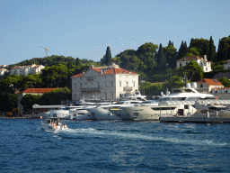 Boats in front of the Department of Economics and Business Economics building of the University of Dubrovnik at the Lapadska Obala street, viewed from the Elaphiti Islands tour boat