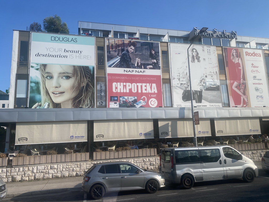 Front of the Dubrovnik Shopping Minceta shopping mall at the Ulica Nikole Tesle street, viewed from the bus from Gru Port to the Grand Hotel Park