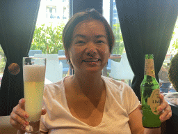 Miaomiao with a Karlovacko Natur Radler Limun beer at the Trinity Oriental Fusion Lounge restaurant