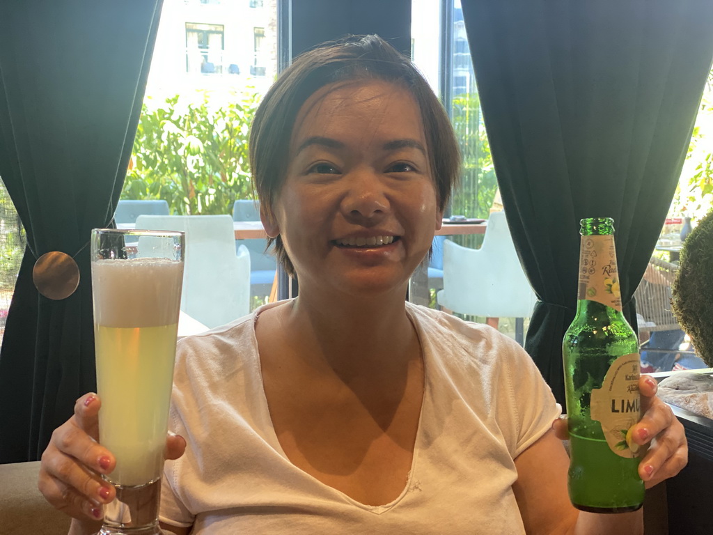 Miaomiao with a Karlovacko Natur Radler Limun beer at the Trinity Oriental Fusion Lounge restaurant