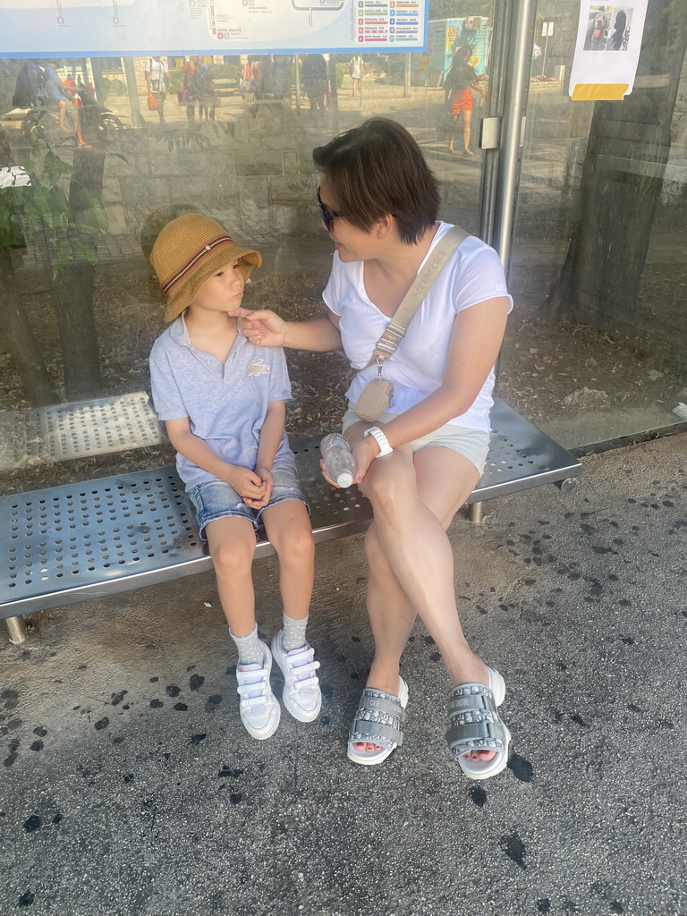 Miaomiao and Max at the bus stop at the Ulica Kralja Tomislava street