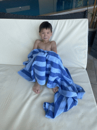 Max on a lounger at the indoor swimming pool of the Grand Hotel Park