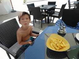 Max having lunch at the outdoor swimming pool of the Grand Hotel Park