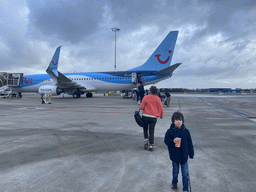 Max in front of our TUI airplane at the Rotterdam The Hague Airport