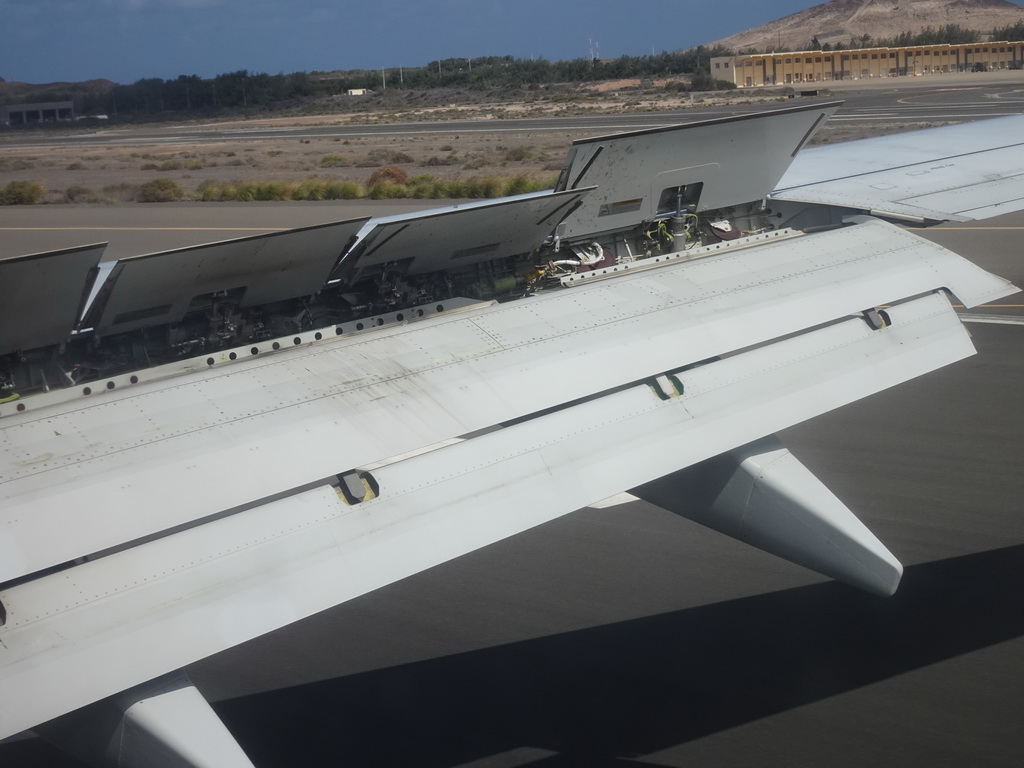 The right wing of the airplane from Rotterdam landing at the Gran Canaria Airport