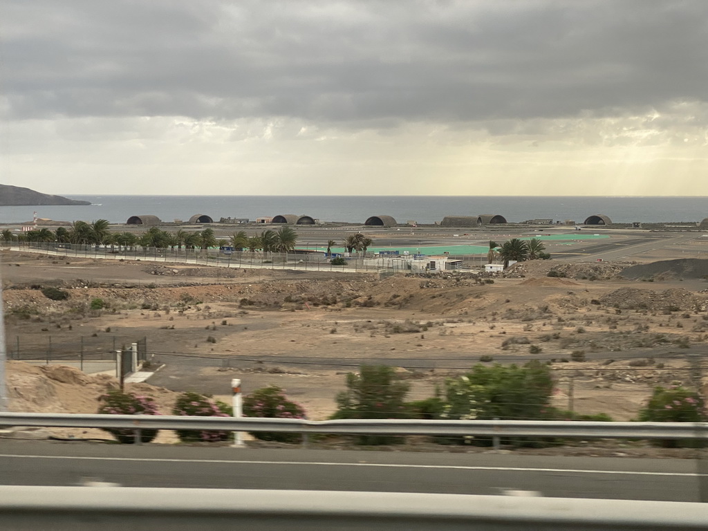 Military jet hangars at the Gran Canaria Airport, viewed from the tour bus on the GC-1 road