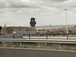 Statue at a roundabout near the town of Valle de Jinamar, viewed from the tour bus on the GC-1 road