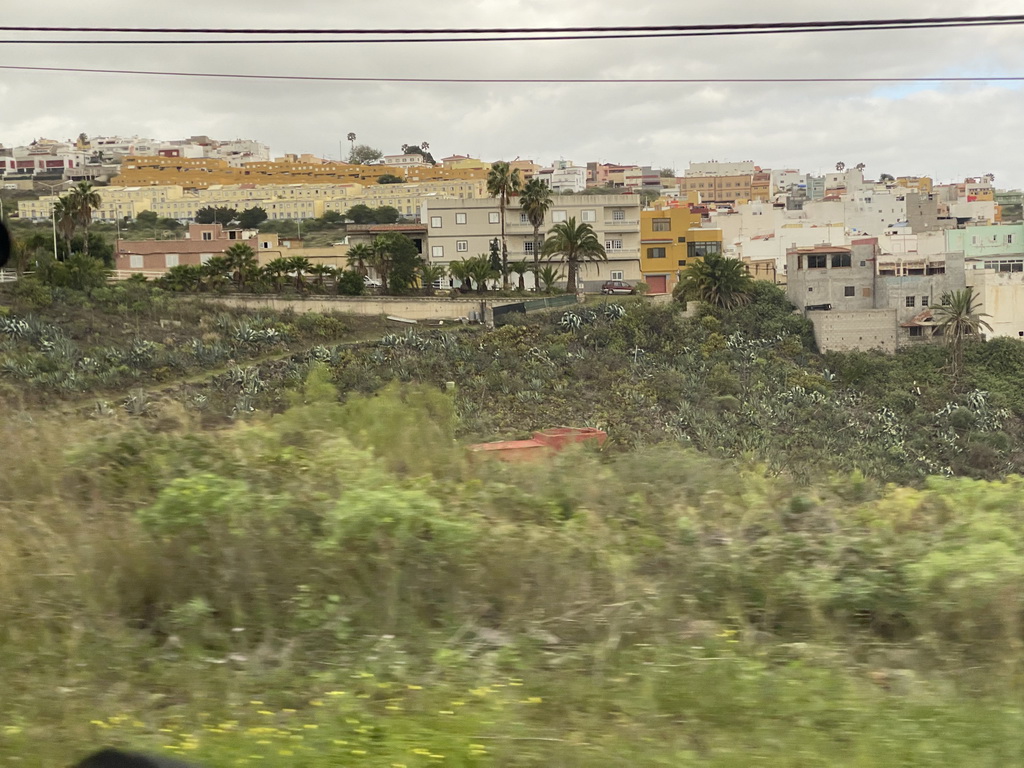 Houses at the town of Tamaraceite, viewed from the tour bus on the GC-3 road