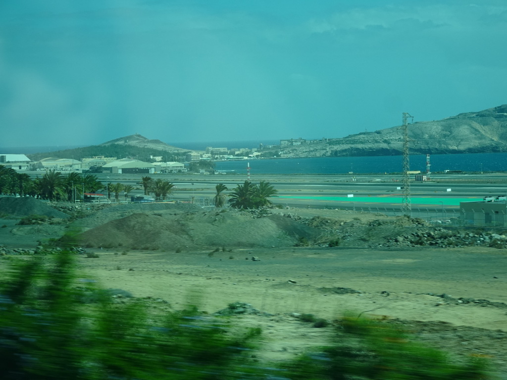 The Gran Canaria Airport, the Bahía de Gando bay and the Punta de Gando hill, viewed from the tour bus on the GC-3 road