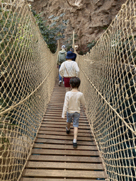 Miaomiao and Max on a rope bridge at the middle floor of the Jungle area at the Poema del Mar Aquarium