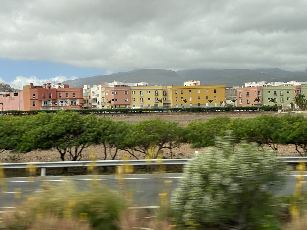 Houses at the town of Carrizal, viewed from the shuttle bus from Maspalomas to the Gran Canaria Airport on the GC-1 road