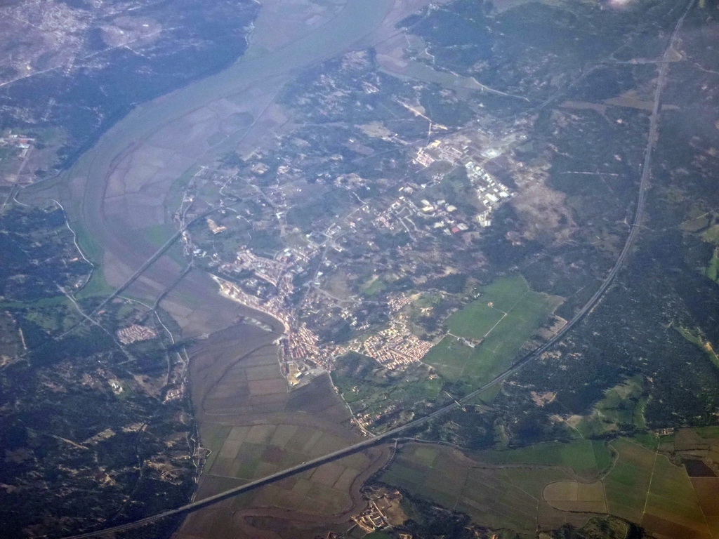 The town of Alcácer do Sal and the Sado River in Portugal, viewed from the airplane to Rotterdam