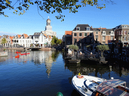 The Hartebrugkerk church, the Waaghoofdbrug bridge and boats in the Oude Rijn river, viewed from the Aalmarkt street