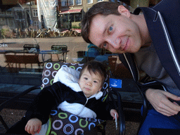 Tim and Max at a restaurant at the Aalmarkt street