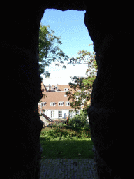 Houses at the Oude Rijn street, viewed through a window at the north side of the Burcht van Leiden castle