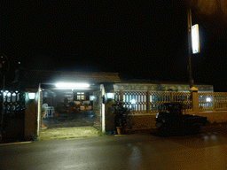 Front of Pizzeria La Mela at the Localita Piano di San Rocco, by night