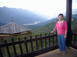 Miaomiao`s mother at Buddhist temple near Lijiang