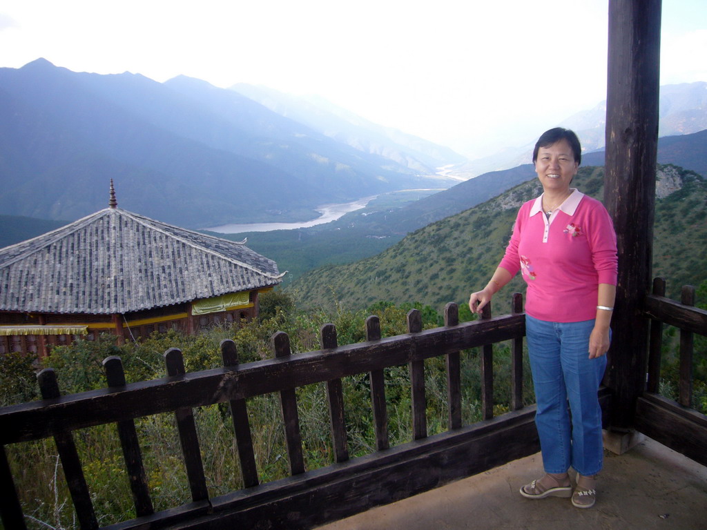 Miaomiao`s mother at Buddhist temple near Lijiang