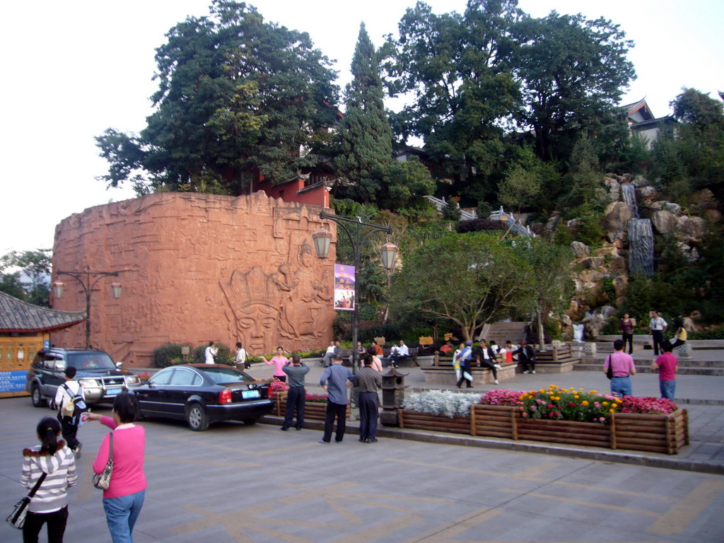 Stone wall and waterfall in the Old City of Lijiang