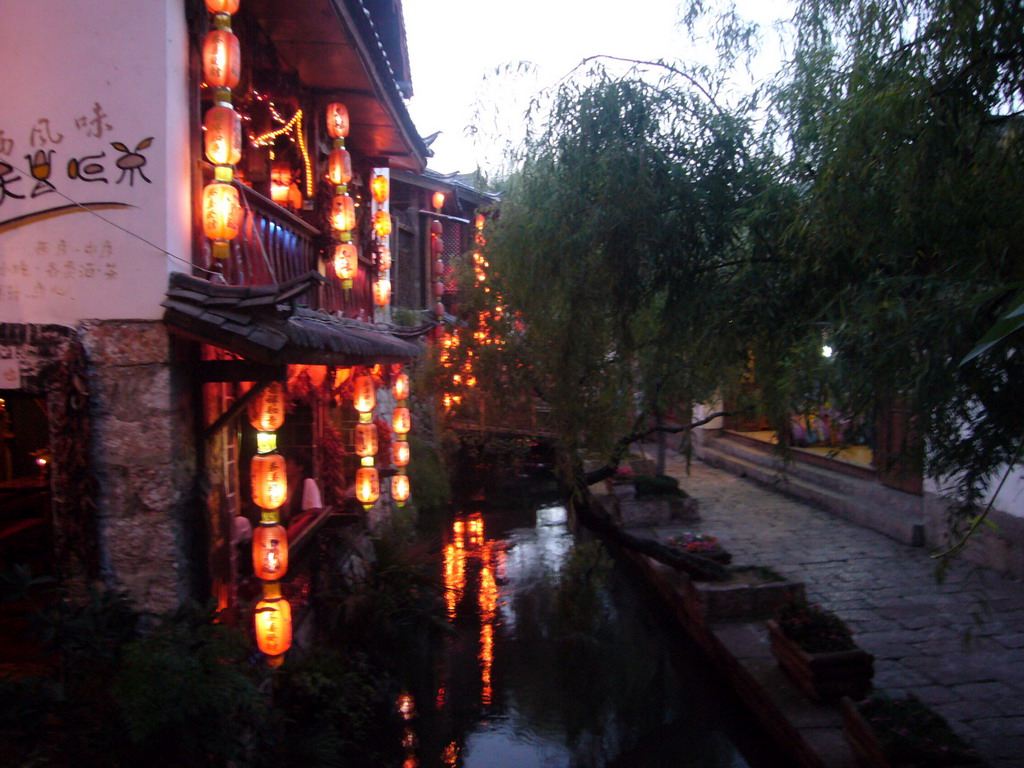 Houses and canal in the Old City of Lijiang, at sunset