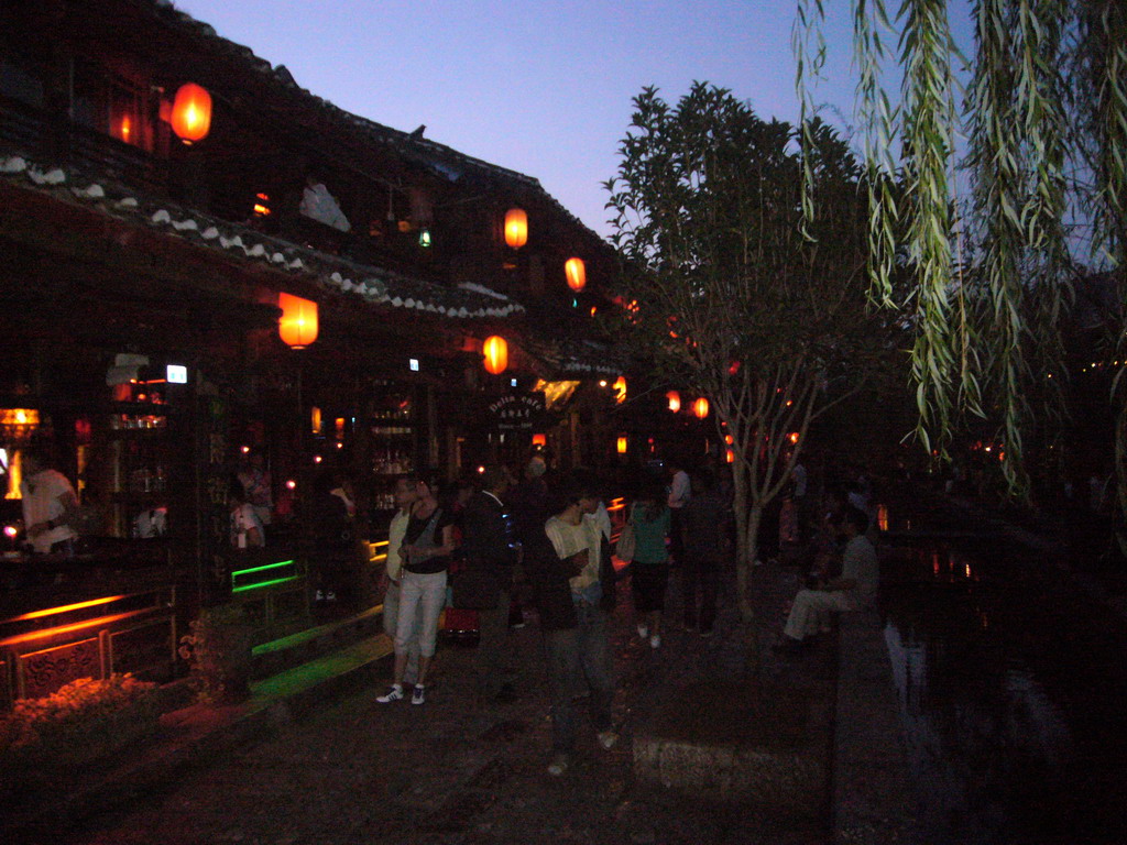 Pub street in the Old City of Lijiang, at sunset