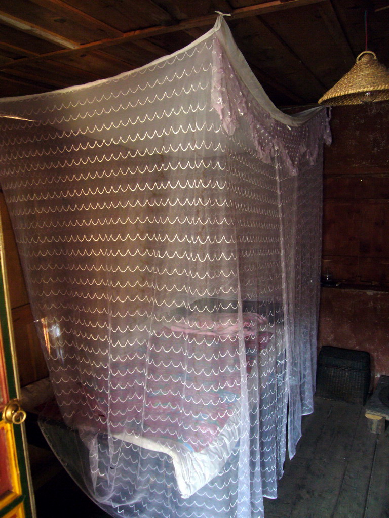 Bedroom in a house of the Mosuo minority, in a Minority Village near Lijiang