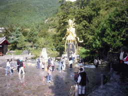 Statue of Dongba human god at Jade Water Village