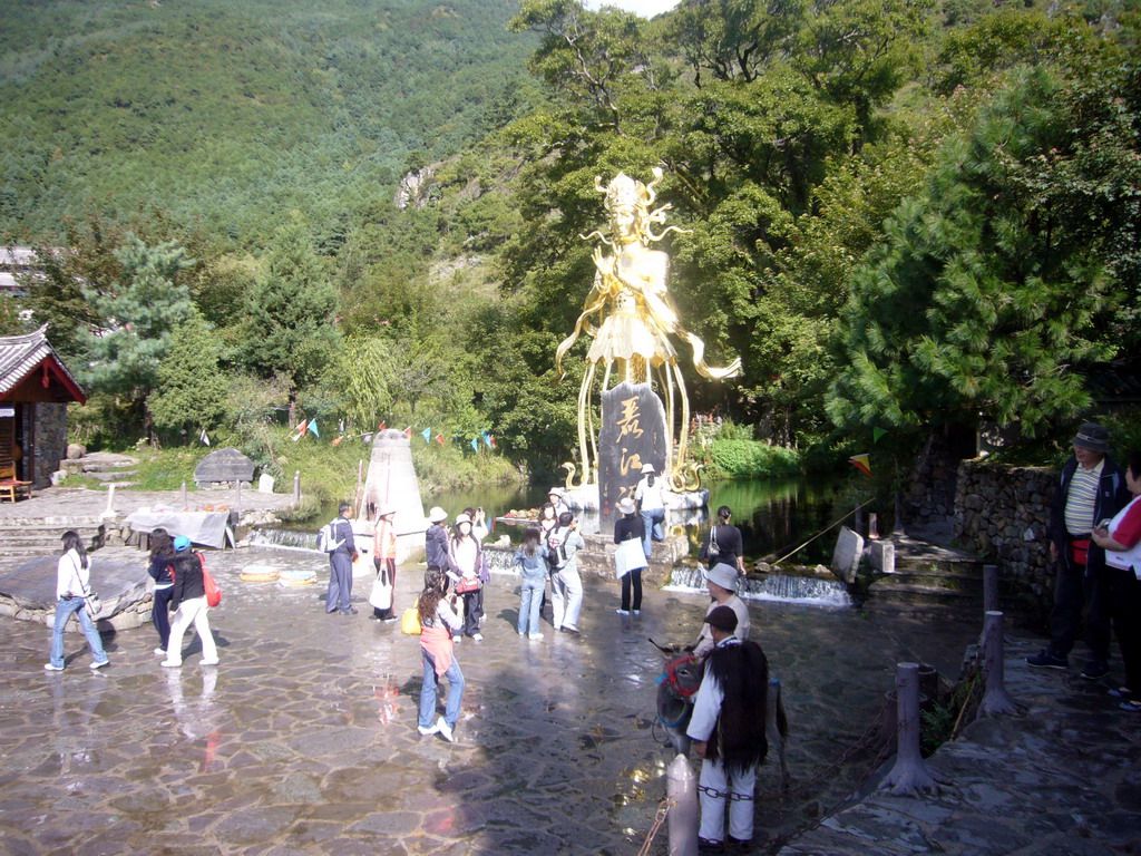 Statue of Dongba human god at Jade Water Village